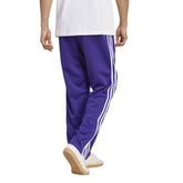 adidas Pantalone adicolor Classics Firebird Uomo Viola | NonSoloSport