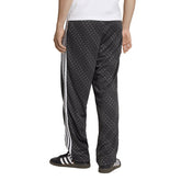 Pantalone Uomo Adidas Firebird Loose Monogram Nero | NonSoloSport