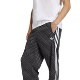 Pantalone Uomo Adidas Firebird Loose Monogram Nero | NonSoloSport