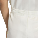 Shorts Donna Adidas x Liberty London Firebird Beige | NonSoloSport