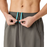 Shorts Uomo Asics Road 2N1 7IN Grigio | NonSoloSport