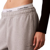 Pantalone Jogger Donna Calvin Klein Monologo Foil Grigio | NonSoloSport