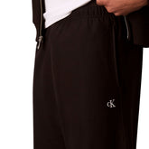 Pantalone Jogger Uomo Calvin Klein French Terry Monogram Nero | NonSoloSport