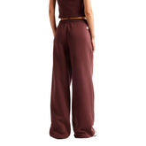 Pantalone Donna New Balance Trackside Bordeaux | NonSoloSport