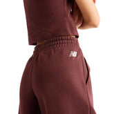 Pantalone Donna New Balance Trackside Bordeaux | NonSoloSport