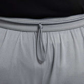 Short Uomo Nike Dri Fit Icon 11In Grigio | NonSoloSport