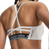 Under Armour Reggiseno Sportivo Project Rock All Train Crossback Donna Bianco | NonSoloSport