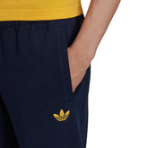 adidas Pantaloni Script Collegiate Uomo Blu Giallo | NonSoloSport