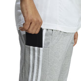adidas Pantalone Essentials 3 Stripes Uomo Grigio | NonSoloSport