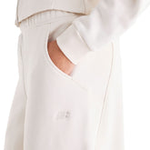 Pantalone Donna New Balance Athletics Crafted Beige | NonSoloSport