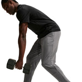 Pantalone Uomo Nike Unlimited Dri-FIT Grigio | NonSoloSport