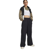 Pantaloni Donna Under Armour Unstoppable Woven Parachute Nero | NonSoloSport